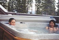 Enjoying our spa under the clear Yukon sky